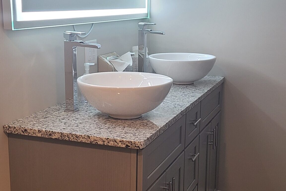 bathroom remodel with countertops and cabinets