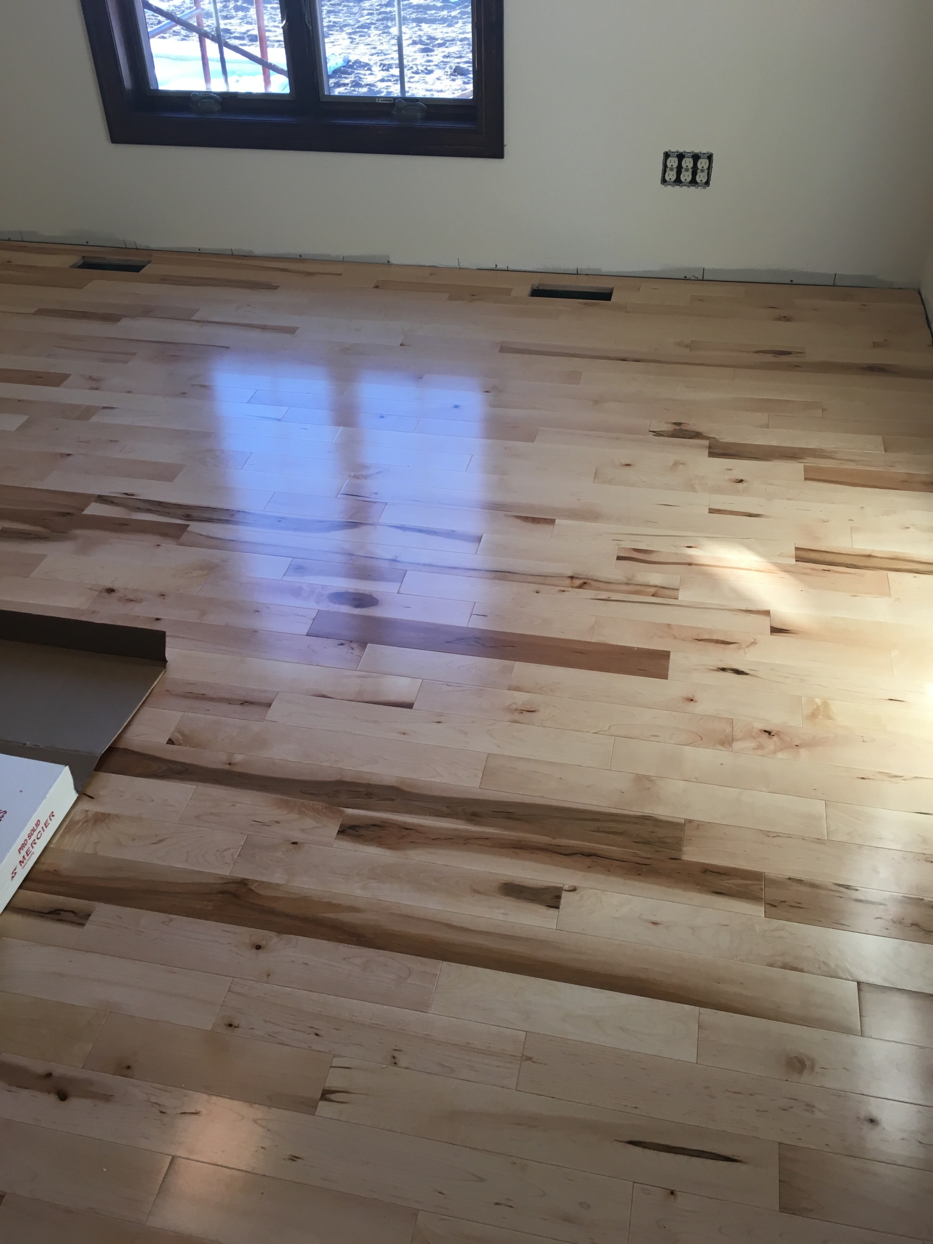 hardwood floor in bedroom